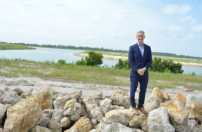 Tom Johnson is the new marketing and leasing manager for Lakewood Ranch Commercial Realty. An 8-acre park, the island in the background,  will connect to the future Waterside Place destination.