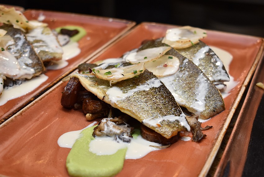 The first course was sunburst trout over wood-fired mushrooms, summer pea puree, Darwin Brewing citrus beer blanc and sunchoke salad at the Fourth Annual Sustainable Seafood Dinner on Aug. 6 at Louies Modern.