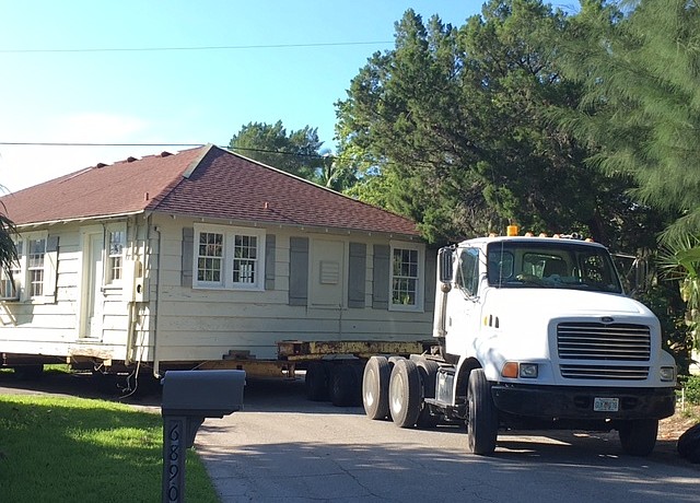 One of the Whitney cottages is loaded and ready to move.