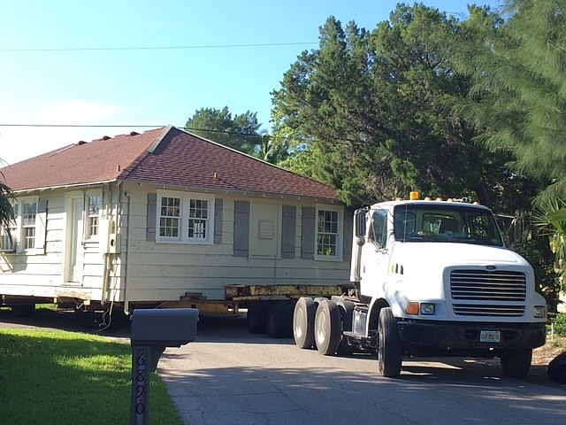 One of the Whitney cottages is loaded and ready to move.