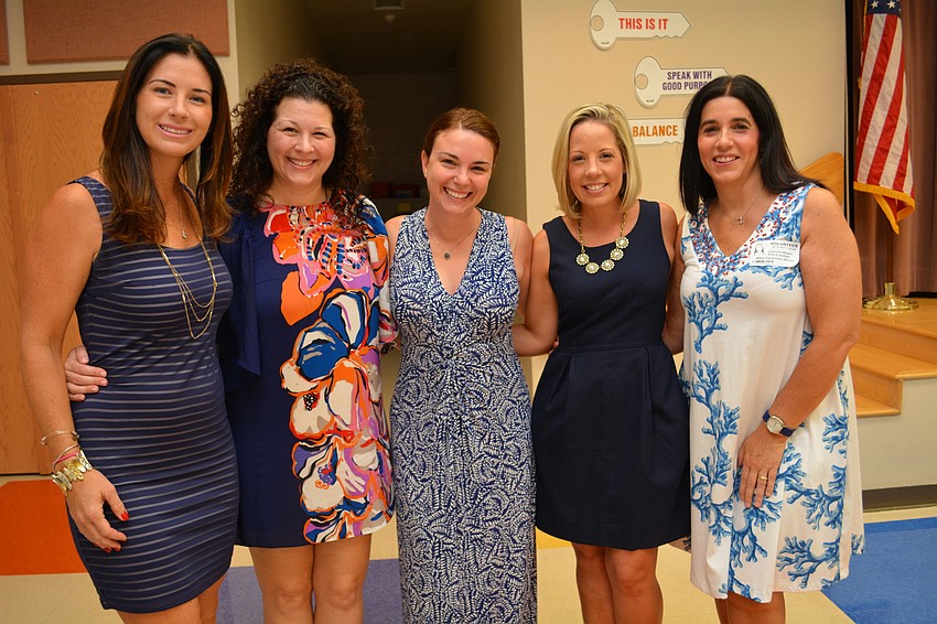 Parent Teacher Organization Vice President  Sky Galliano, President Bianca Lawrence, treasurer Tara Merino, Assistant Principal Billie-Jo Fintel and secretary Cathy Magda make sure to mingle with parents at the Boo Hoo breakfast.
