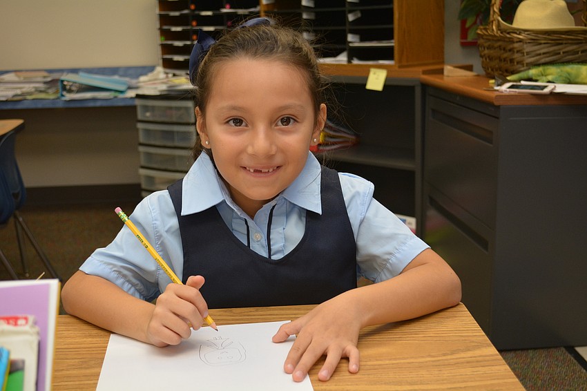 Valentina Oviedeo-Fajardo is all smiles for her first day of first grade at Willis Elementary.