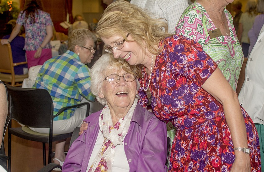 Director of Nursing Gloria Wright hugs Marie Brandstatter.