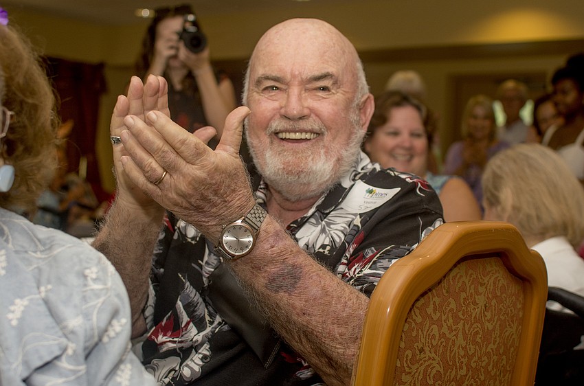 Charles Loeffler Jr. applauds after a performance from the Pine's onsite preschool.