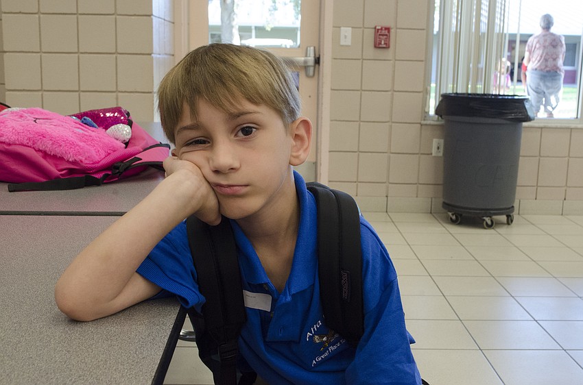 First grader Kyle Egan speaks for a lot of kids when he says he is not excited about the first day of school.