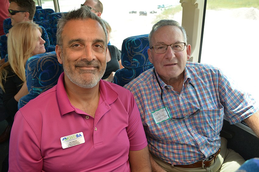 Jag Grewal, with Ian Black Real Estate and Alliance board member, rides with Marty Taffel, of Wakefield Beasley & Associates.