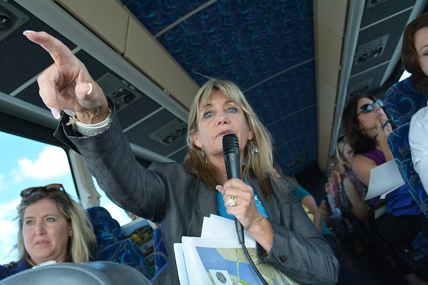 Homes by Towne Vice President of Sales Kitt Kearney shows of the amenity center and model homes under construction for the future Lakehouse Cove.