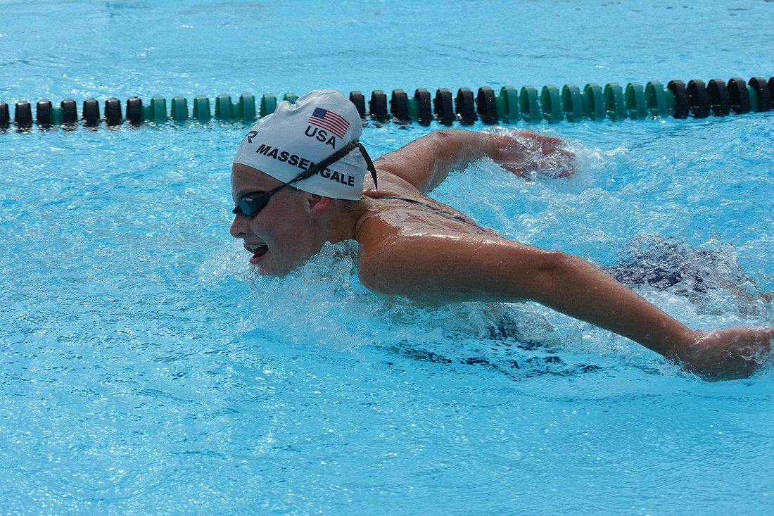 Emily Massengale practices her butterfly stroke.