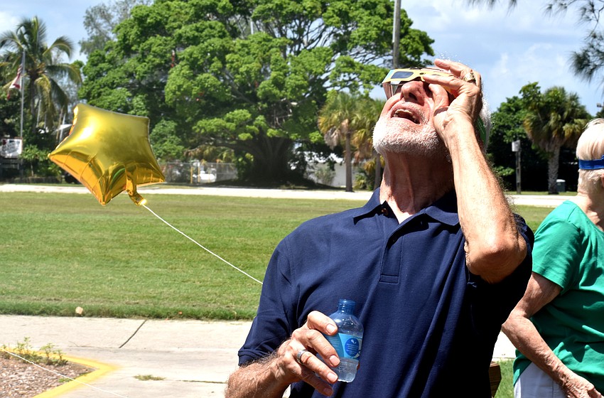 Tom Thomas gawks at the moving moon.