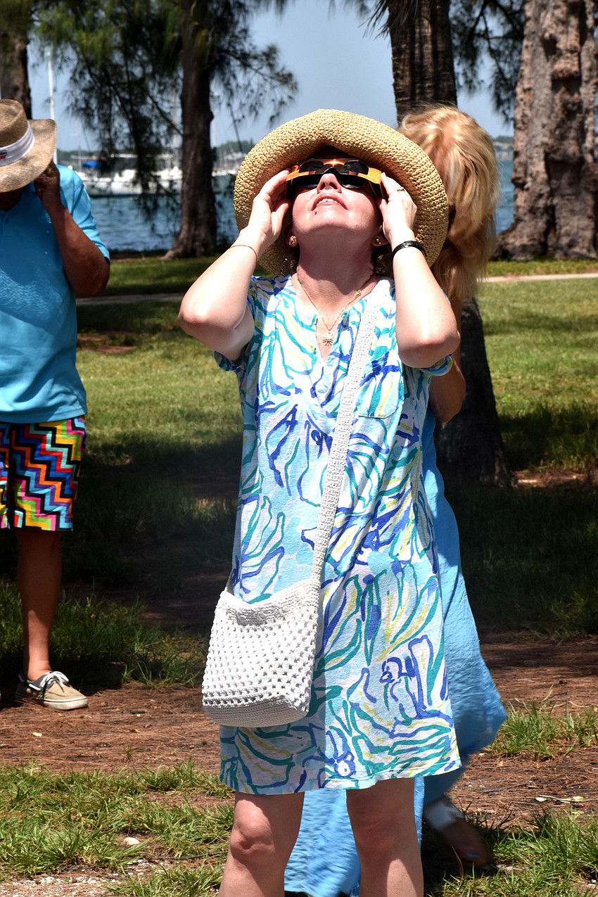 Allison Jones watches the solar eclipse.