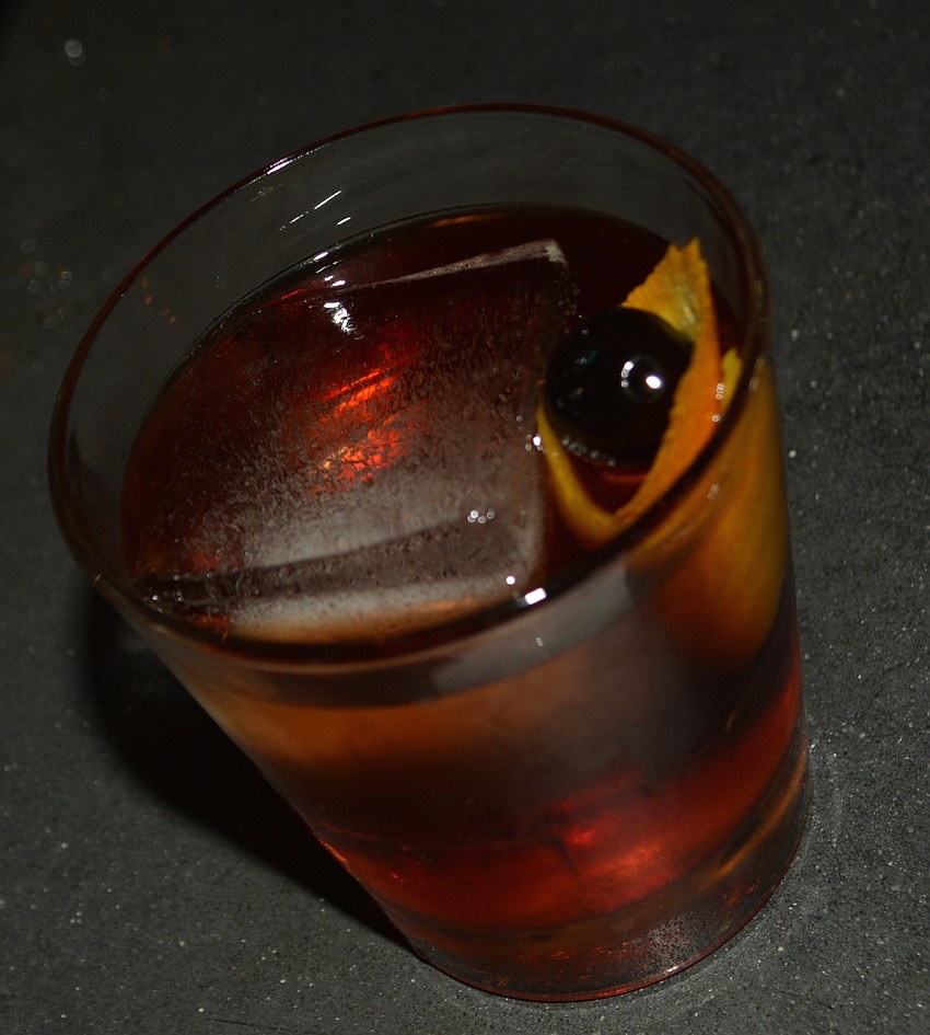 Barrel-aged Bulleit Bourbon is combined with Nolet's Gin, market blackberries, Creme de Peach and fresh lemon juice to make a Foghorn Leghorn.