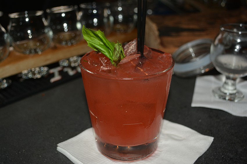 The Strawberry Basil Berry Gin is a combination of house-crafted strawberry puree, market basil, fresh lemon, Nolet's gin and carbonated water.