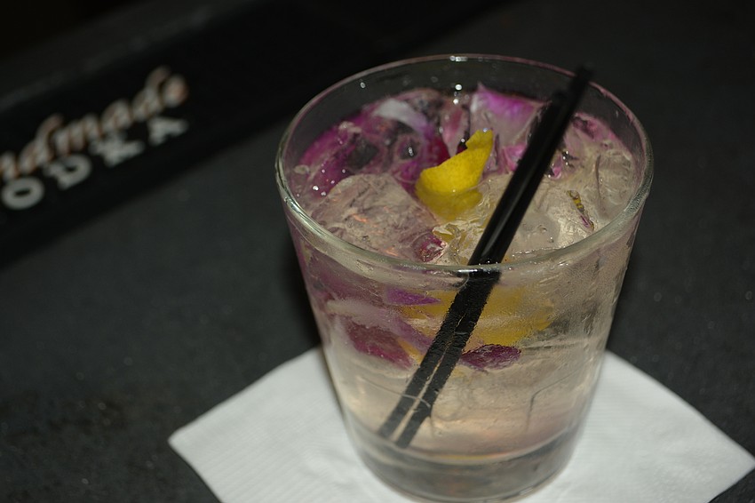 Lavender Lemonade is a mix of Absolut Citron, fresh market lemon, house-made lavender simple and water.