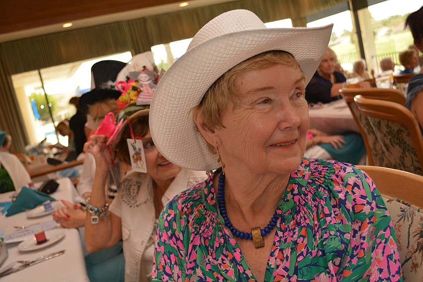 Nancy Andrews smiles as the program begins.
