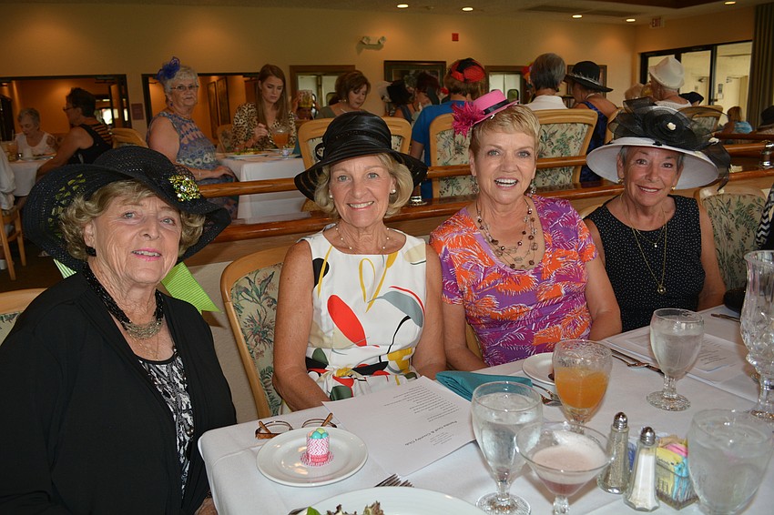 Nancy Smith Beth Bittler, Theresa Boley and Wendy McClurg enjoy quiche and salad for lunch.