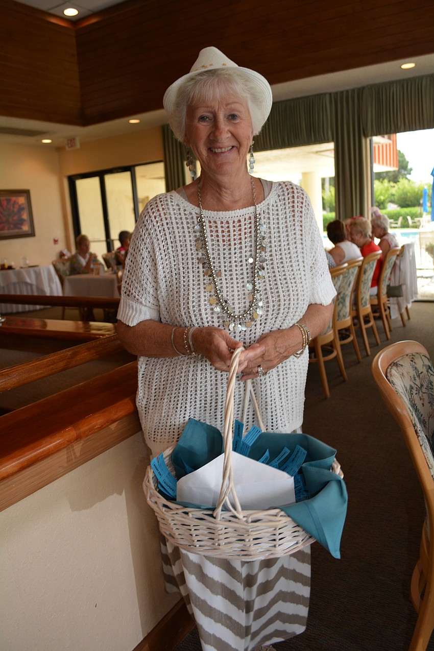 Marlene Danielowicz sells raffle tickets.