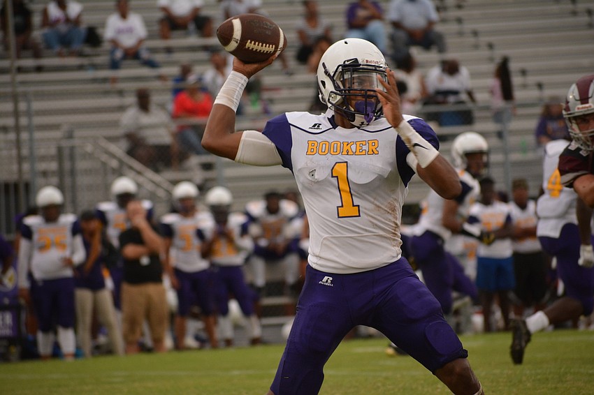 Booker quarterback Talik Keaton throws a first-quarter pass.