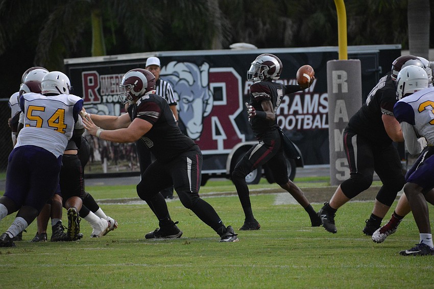 Riverview quarterback Arthur Brantley throws a sideline pass.
