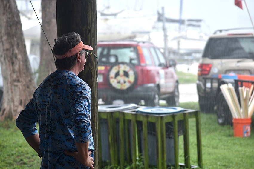 Jeff Jamison watches as the storm rolled over Sarasota Bay.