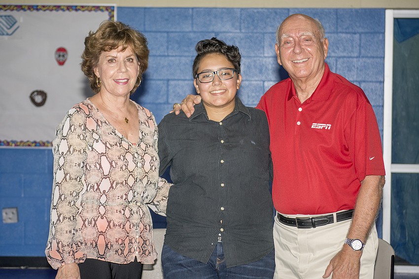 Lorraine Vitale, scholarship recipient Andrea Aray and Dick Vitale