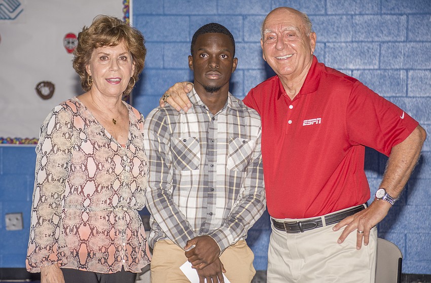 Lorraine Vitale, scholarship recipient Fritz Azor and Dick Vitale