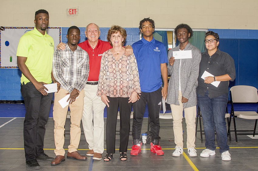 Boys & Girls Club teen specialist Geoffrey Gilot, Fritz Azor, Dick Vitale, Lorraine Vitale, Maurice Cook, Hassan Hogan and Andrea Aray