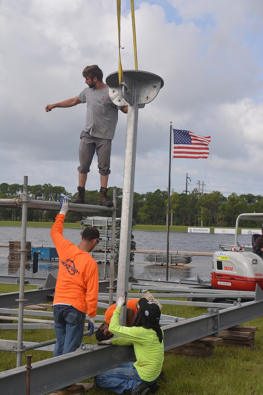 Construction begins on the 2,000-seat grandstand.