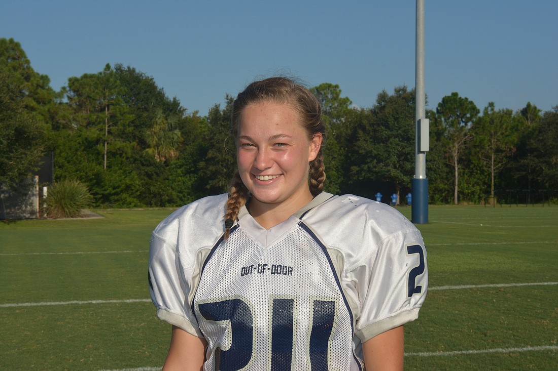 Christina Lutton is the first girl to grace The Out-of-Door Academy&#39;s varsity football roster.