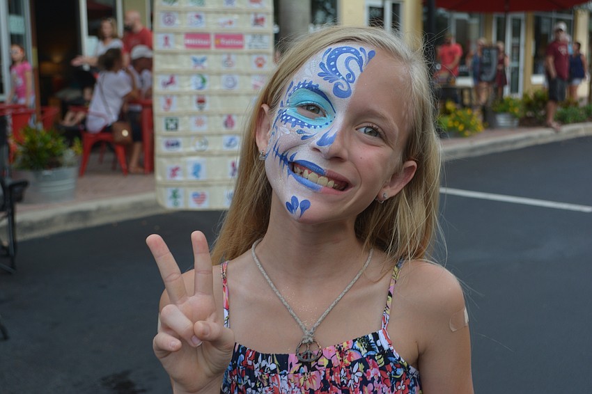 East County's Keira Drumgool, 11, learns there are two sides to every story at Music on Main.