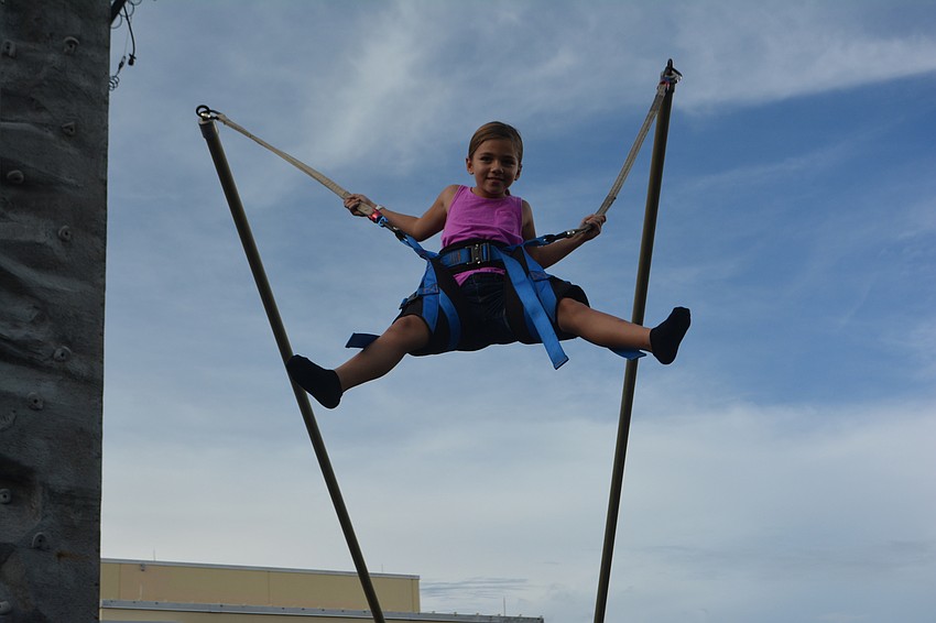 Lakewood Ranch's Juliana Fuschetto, 8, springs into action during Music on Main.