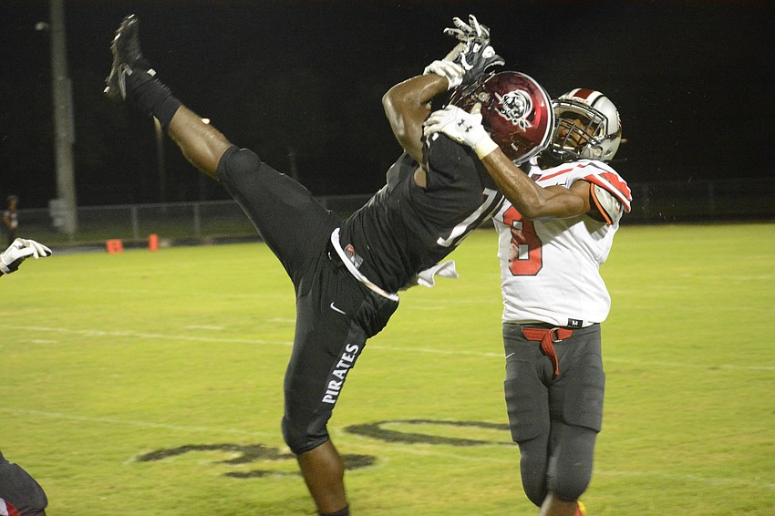 Knowledge McDaniel get tangled with a Clearwater defender. Defensive pass interference was called on Clearwater.