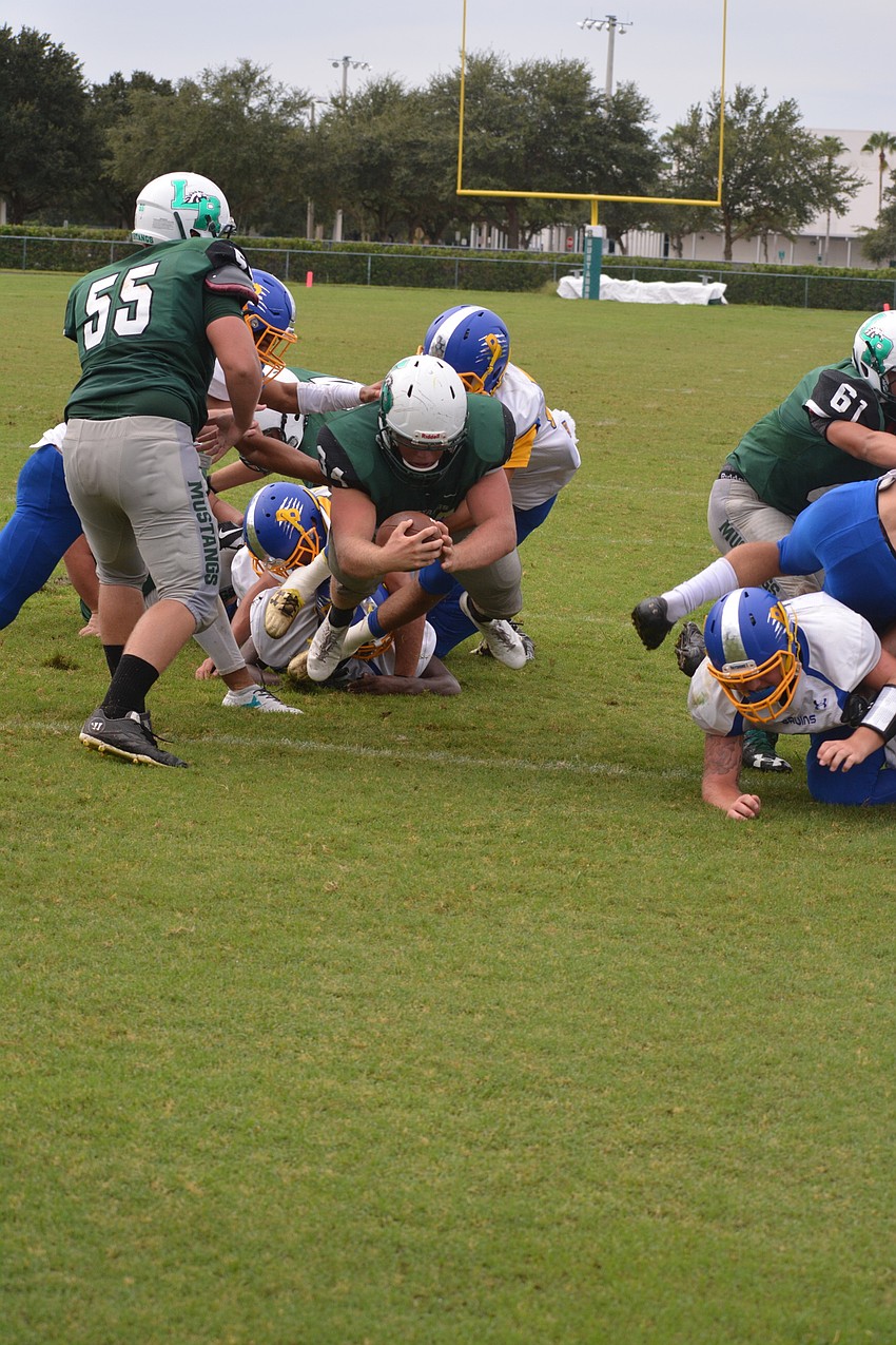 Chase Sharp dives into the end zone fora touchdown.