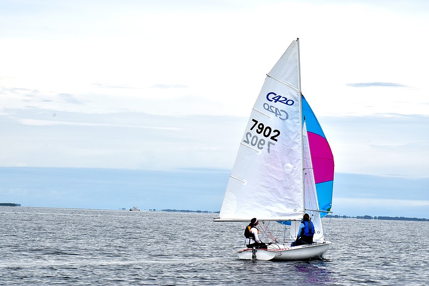 Clouds loomed over Sarasota Bay but any lingering rain held off.