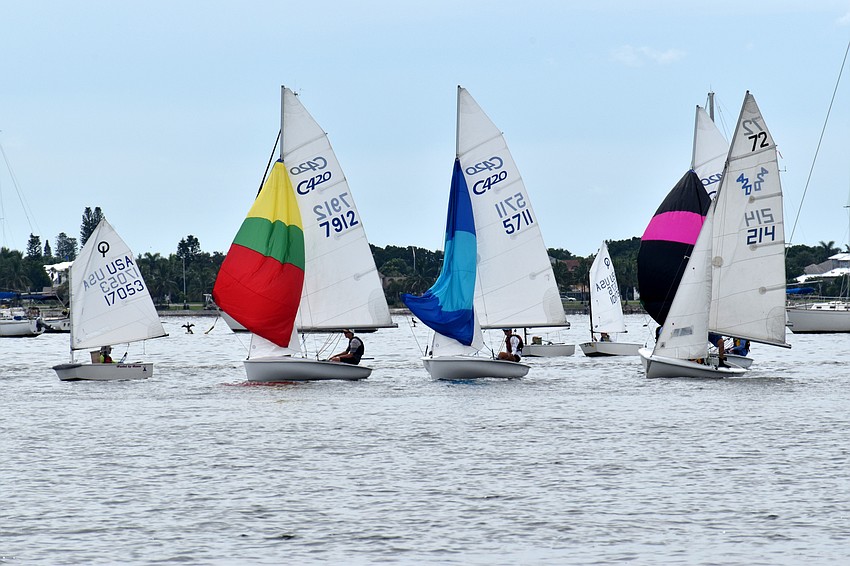 Clouds loomed over Sarasota Bay but any lingering rain held off.