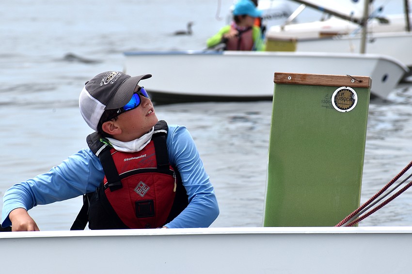 Sailors made their way out on the water to wait for the wind to pick up.