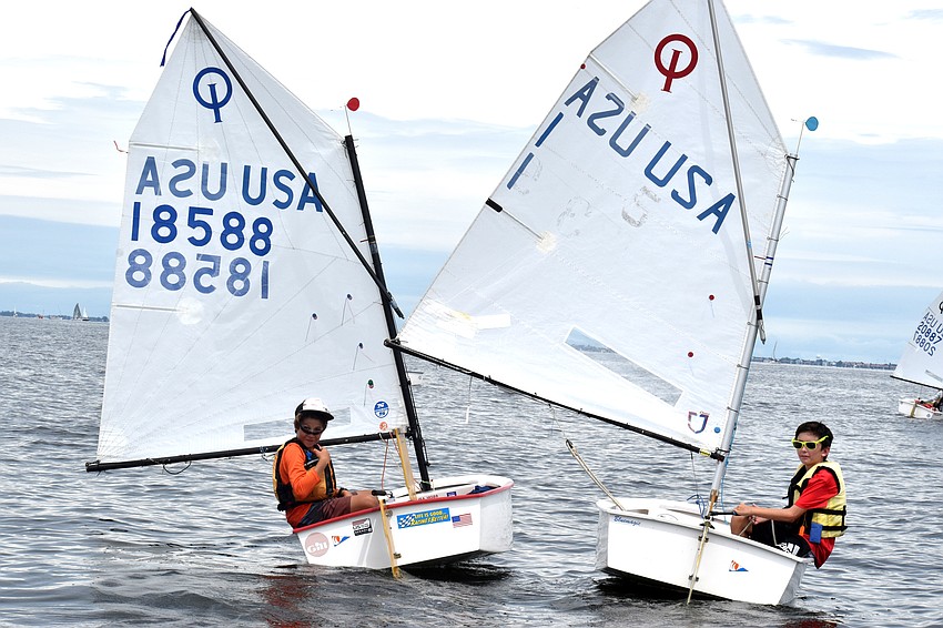 Sailors laughed and chatted on their way out to the race start line.
