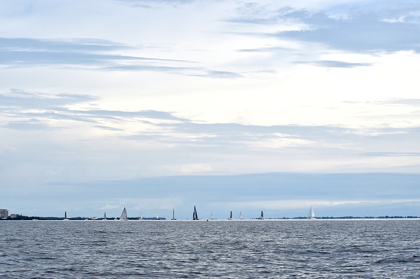 Clouds loomed over Sarasota Bay but any lingering rain held off.