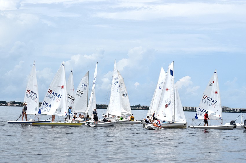 Clouds loomed over Sarasota Bay but any lingering rain held off.