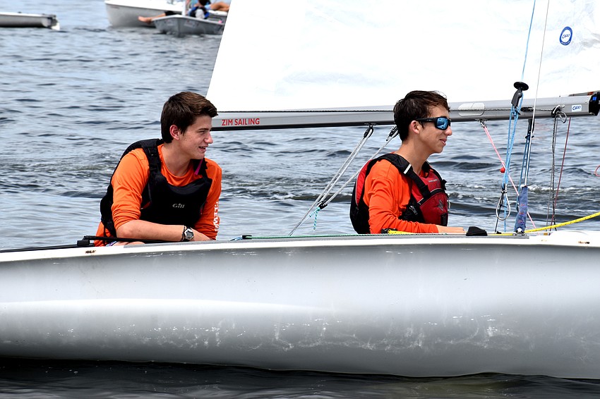Sailors laughed and chatted on their way out to the race start line.