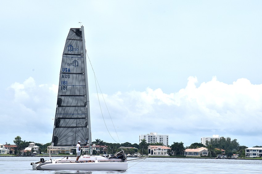 Clouds loomed over Sarasota Bay but any lingering rain held off.
