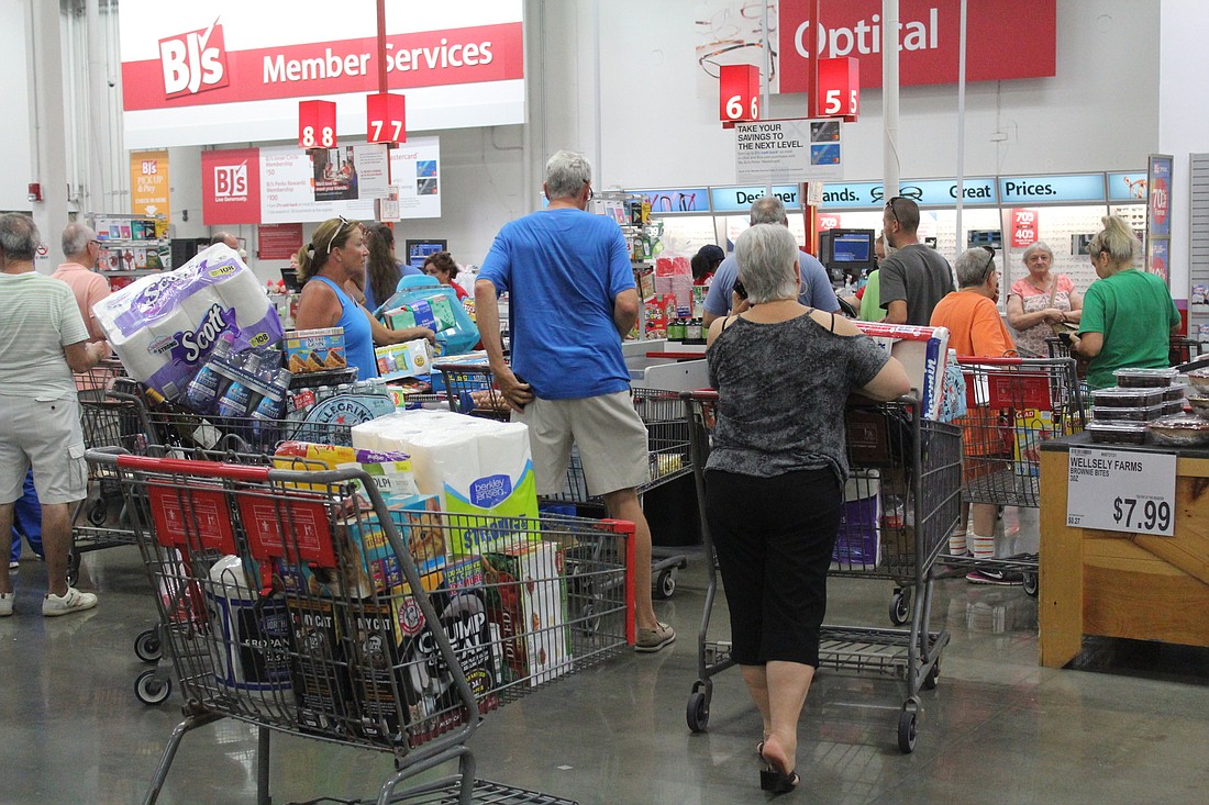 Local residents buy the necessary resources to stay safe during Hurricane Irma at BJ&#39;s Wholesale.