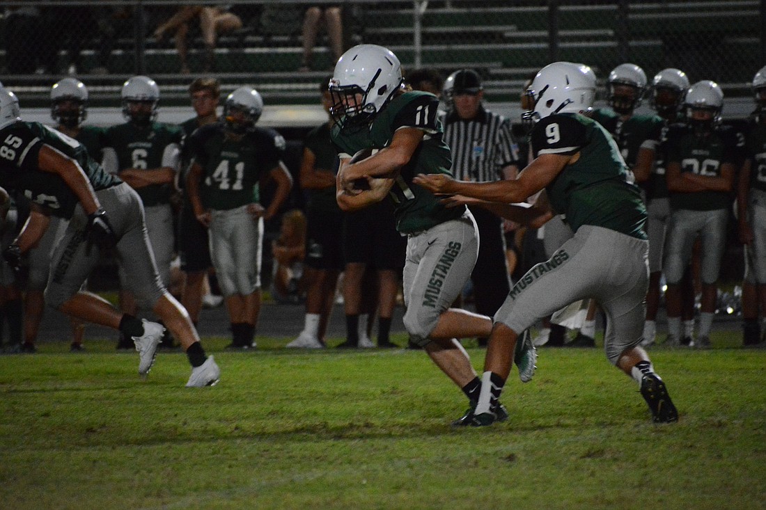 Lakewood Ranch senior running back Mason Fischer (11) will take on a larger role this season.