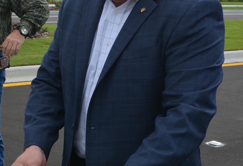 Your Observer Photo Sarasota County Commissioner Mike Moran gets a