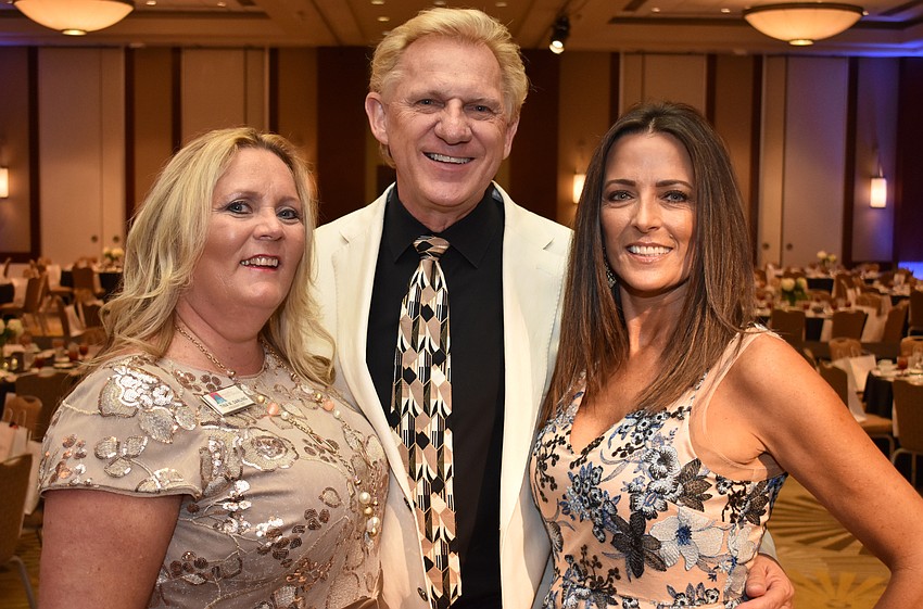 Chairwoman Tina Darling, Peter Salefsky and Women’s Council of Realtors Sarasota President Maryellen Paterson