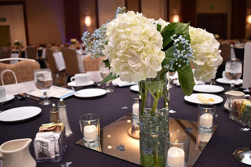 Every table was adorned with a floral centerpiece at the Women’s Council of Realtors Sarasota 2017 Fashion Show: “The Pieces Make the Whole” on Sept. 6 at Hyatt Regency Sarasota.