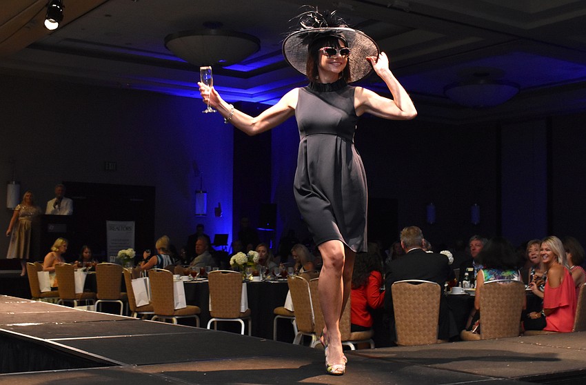 Sharon Gould channels her inner fashionista during the Women’s Council of Realtors Sarasota 2017 Fashion Show: “The Pieces Make the Whole” on Sept. 6 at Hyatt Regency Sarasota.