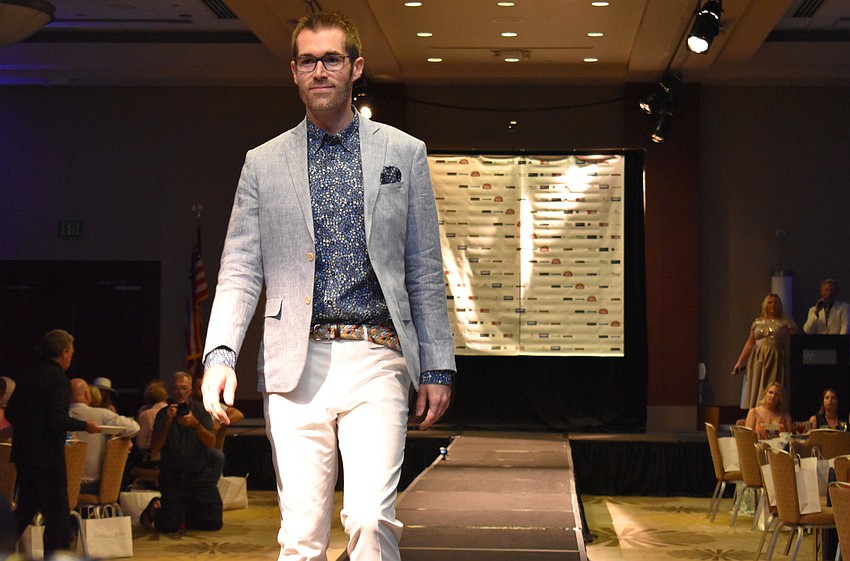 Matt Bohanon walks the runway during the Women’s Council of Realtors Sarasota 2017 Fashion Show: “The Pieces Make the Whole” on Sept. 6 at Hyatt Regency Sarasota.