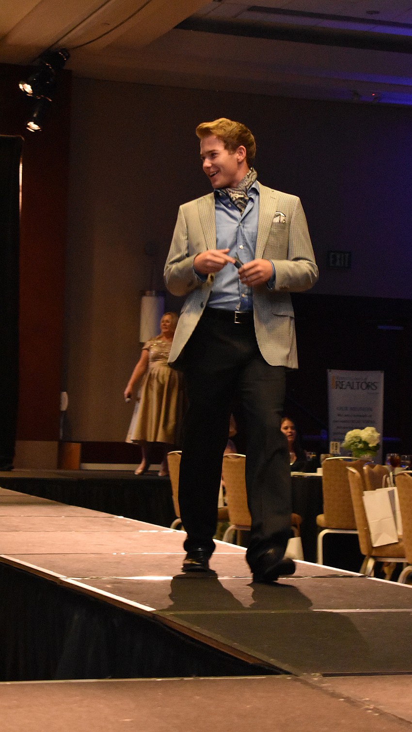 Bryan Dunlap is all smiles during the Women’s Council of Realtors Sarasota 2017 Fashion Show: “The Pieces Make the Whole” on Sept. 6 at Hyatt Regency Sarasota.