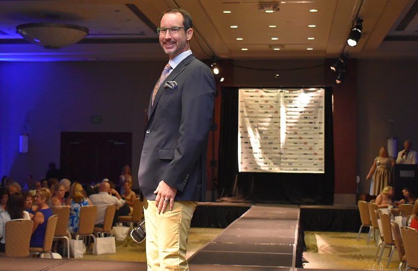 Jesse Sunday strikes a pose on the runway during the Women’s Council of Realtors Sarasota 2017 Fashion Show: “The Pieces Make the Whole” on Sept. 6 at Hyatt Regency Sarasota.