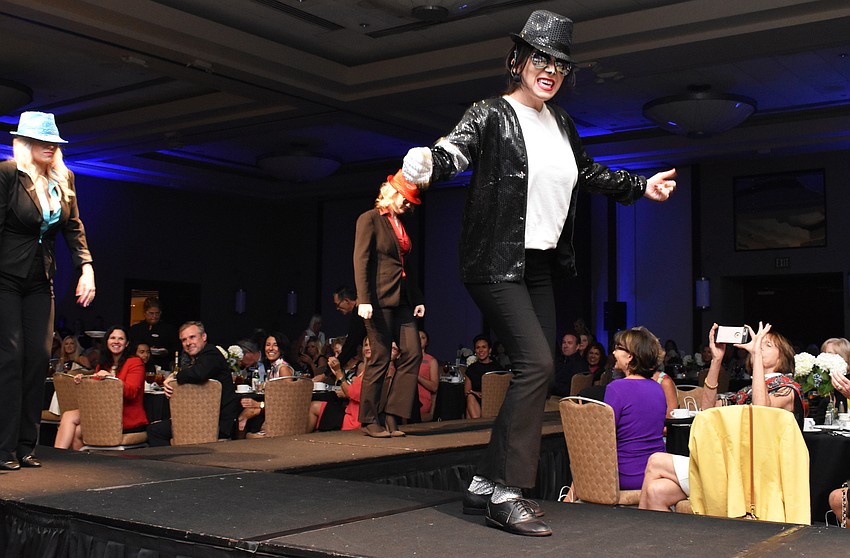 Kristy Lochead, acting as a Michael Jackson impersonator, performed a lip sync routine as a kickoff to the Women’s Council of Realtors Sarasota 2017 Fashion Show: “The Pieces Make the Whole” on Sept. 6 at Hyatt Regency Sarasota.